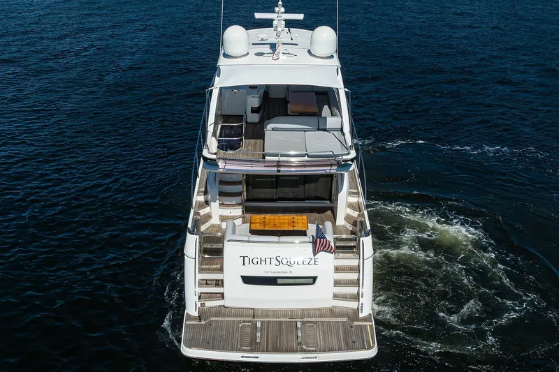 Tight Squeeze Yacht Photos Pics Luxury yacht Princess F64, 2016 model, cruising on open water.