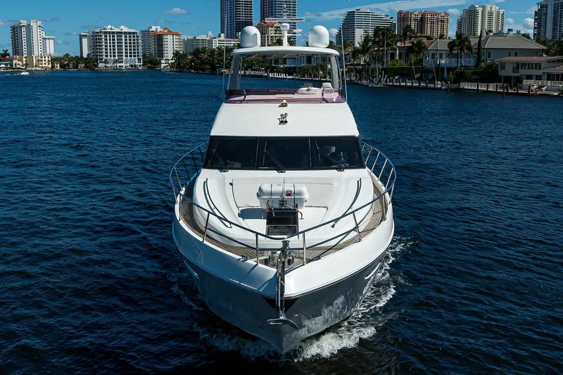 Tight Squeeze Yacht Photos Pics Luxury Princess F64 yacht cruising near city skyline, 2016 model.