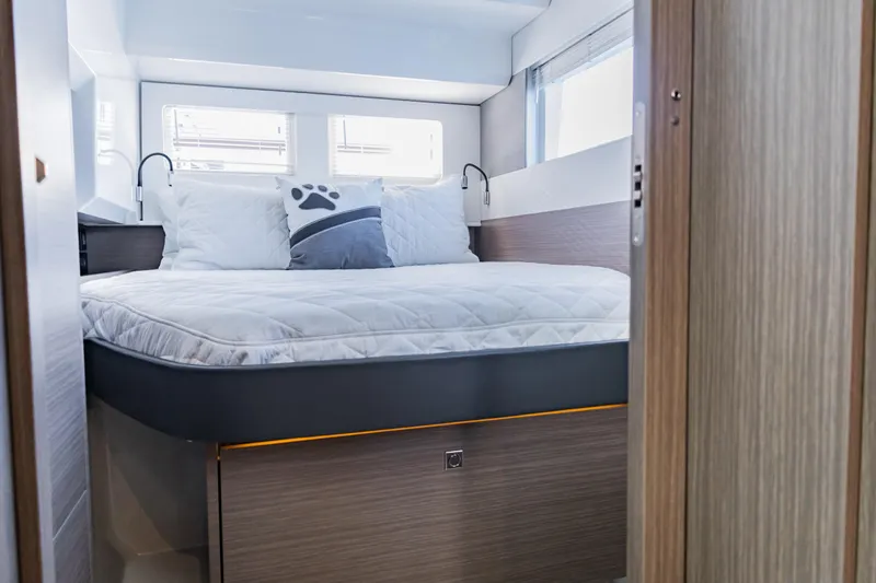 Mabinti Yacht Photos Pics Luxurious bedroom interior of 2024 Leopard 40 Powercat yacht with modern design.