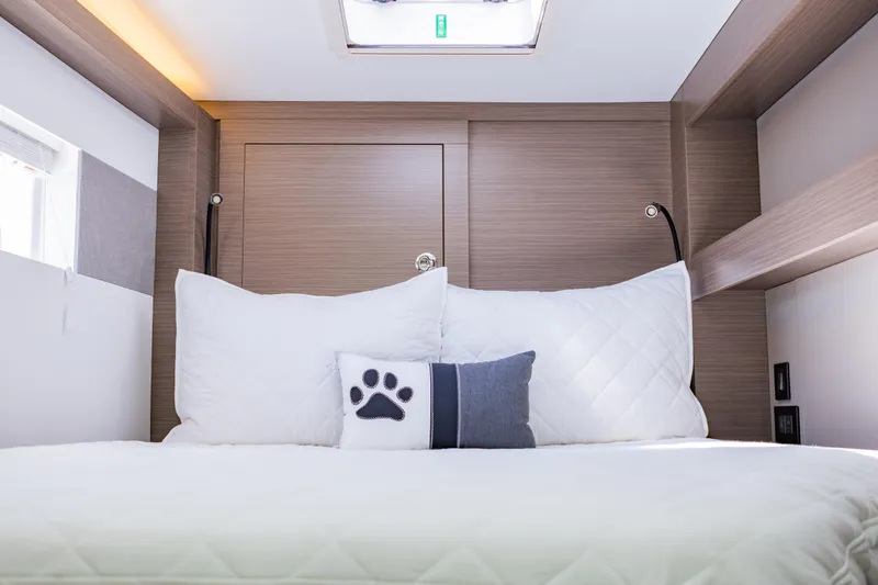 Mabinti Yacht Photos Pics Luxurious cabin interior of 2024 Leopard 40 Powercat with plush bedding and modern design.