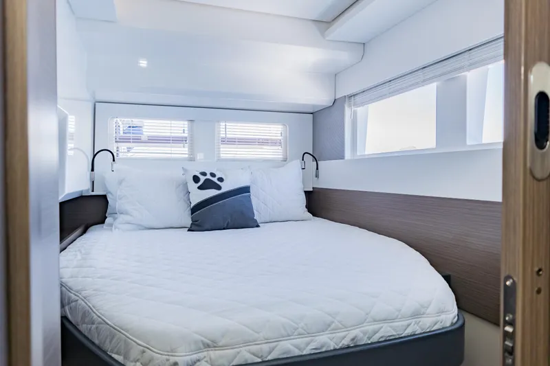 Mabinti Yacht Photos Pics 2024 Leopard 40 Powercat cabin with cozy bed and modern design.