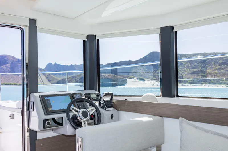 Mabinti Yacht Photos Pics Interior view of 2024 Leopard 40 Powercat yacht with scenic ocean backdrop.