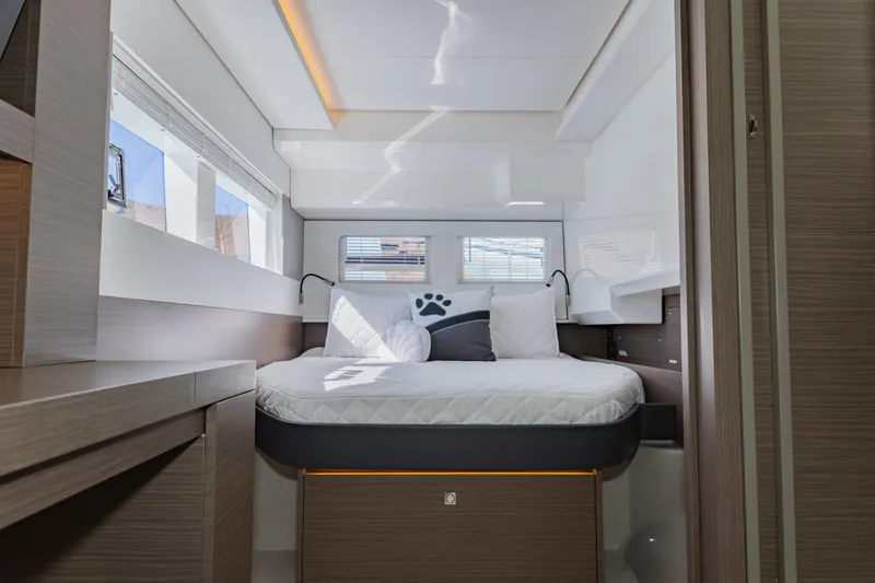 Mabinti Yacht Photos Pics 2024 Leopard 40 Powercat cabin interior with modern design and comfortable bedding.