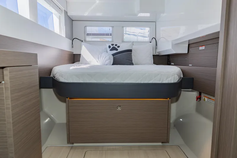 Mabinti Yacht Photos Pics 2024 Leopard 40 Powercat cabin with modern bed and stylish wood accents.