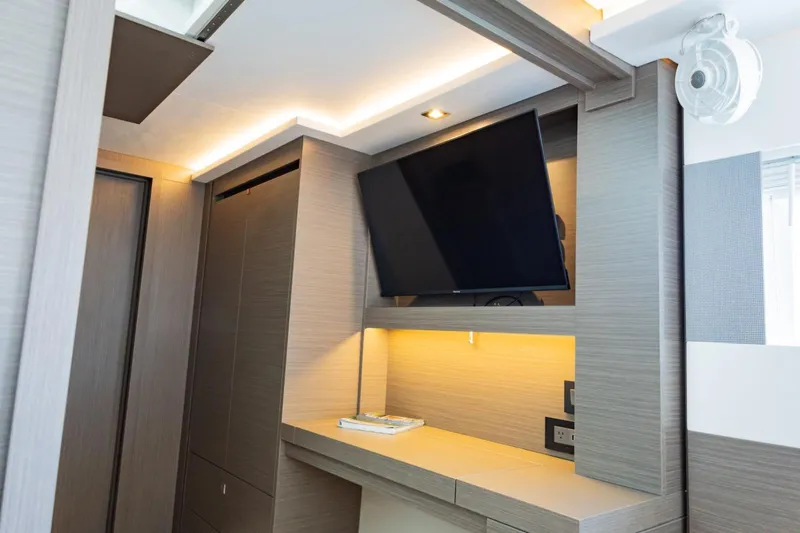 Mabinti Yacht Photos Pics Modern interior of 2024 Leopard 40 Powercat with TV and ambient lighting.