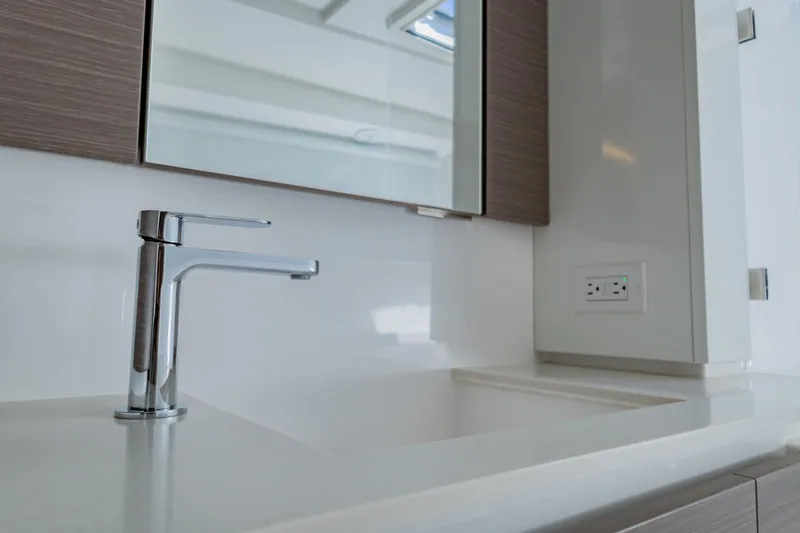 Mabinti Yacht Photos Pics Modern bathroom sink with sleek faucet on Leopard 40 Powercat 2024 yacht.