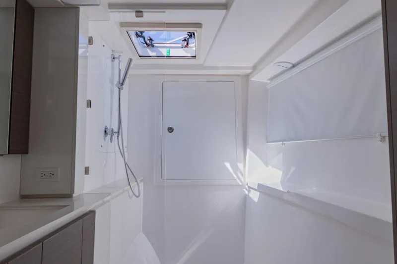 Mabinti Yacht Photos Pics Interior of 2024 Leopard 40 Powercat bathroom with shower and skylight.