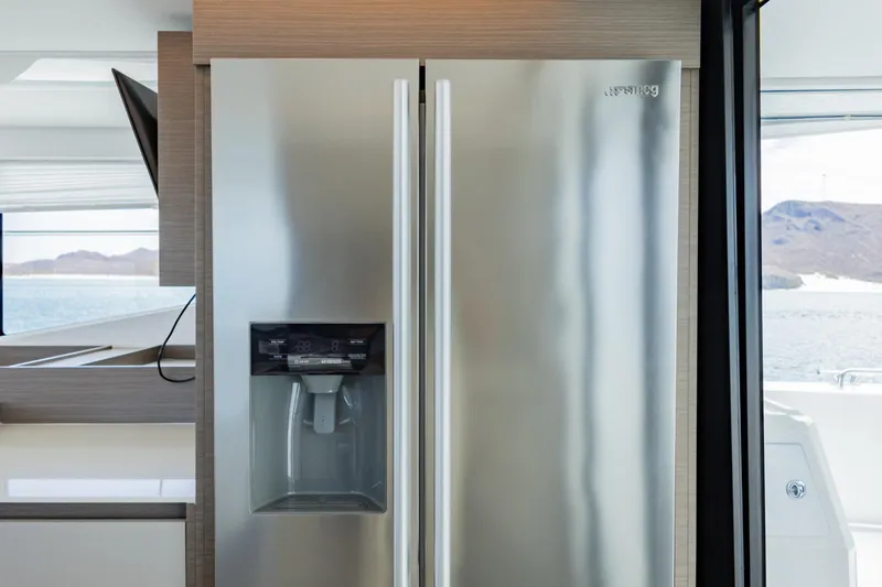 Mabinti Yacht Photos Pics Stainless steel refrigerator on 2024 Leopard 40 Powercat yacht interior.