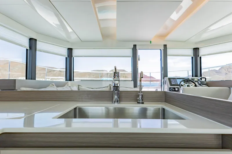 Mabinti Yacht Photos Pics Modern interior of 2024 Leopard 40 Powercat yacht with sleek kitchen design.