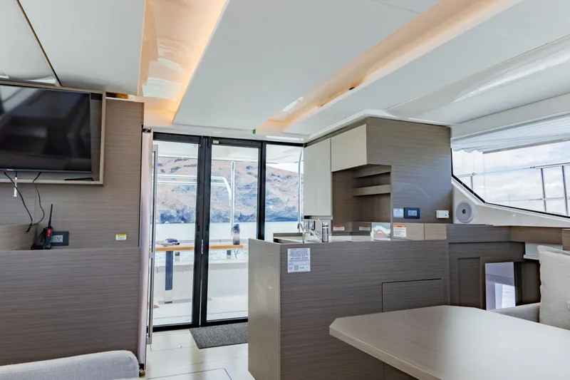 Mabinti Yacht Photos Pics Luxurious interior of 2024 Leopard 40 Powercat yacht with modern design and large windows.