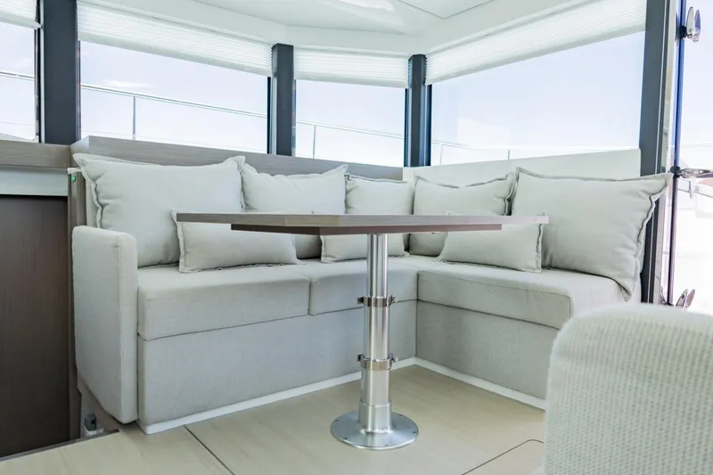 Mabinti Yacht Photos Pics Luxurious interior of 2024 Leopard 40 Powercat with plush seating and modern table.