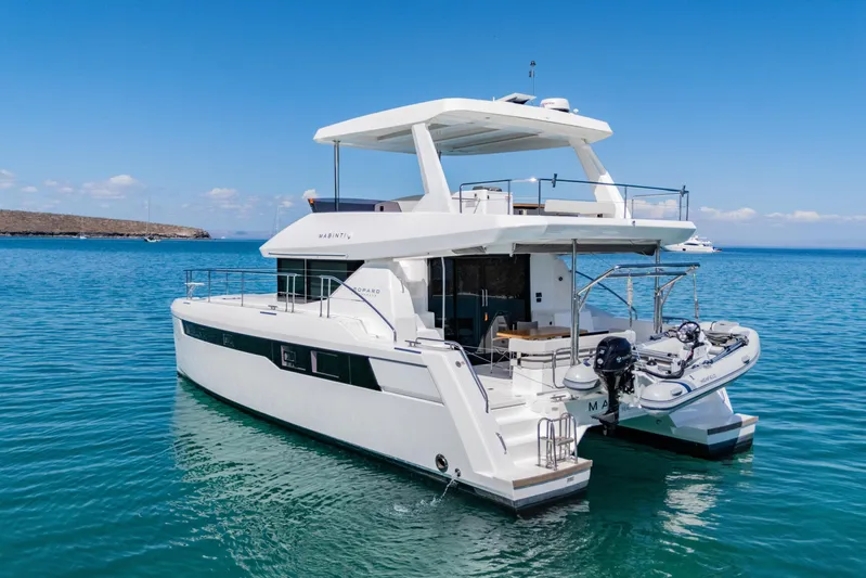 Mabinti Yacht Photos Pics 2024 Leopard 40 Powercat yacht on calm blue water, showcasing modern design.