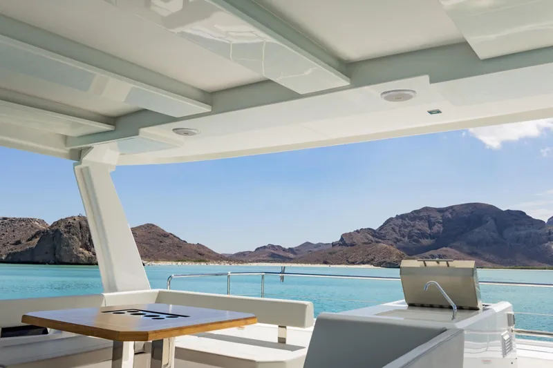 Mabinti Yacht Photos Pics 2024 Leopard 40 Powercat yacht interior with ocean and mountain view.