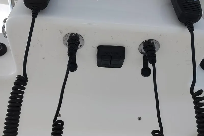 Never Enough Yacht Photos Pics Control panel with cables on a 2017 Out Island SeaTek 36 Express boat.