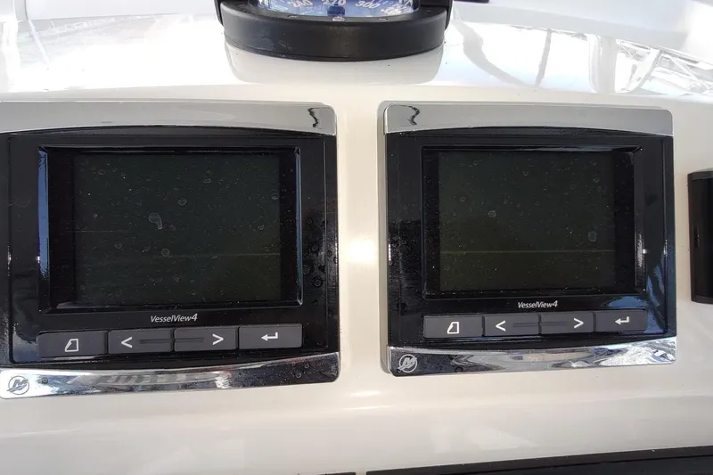 Never Enough Yacht Photos Pics Dual VesselView4 displays on 2017 Out Island SeaTek 36 Express boat dashboard.