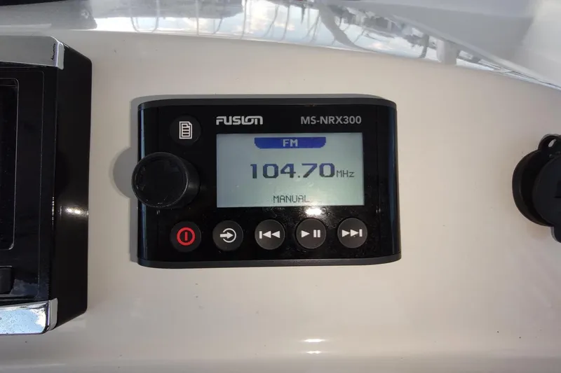 Never Enough Yacht Photos Pics Fusion MS-NRX300 radio display on 2017 Out Island SeaTek 36 Express boat.
