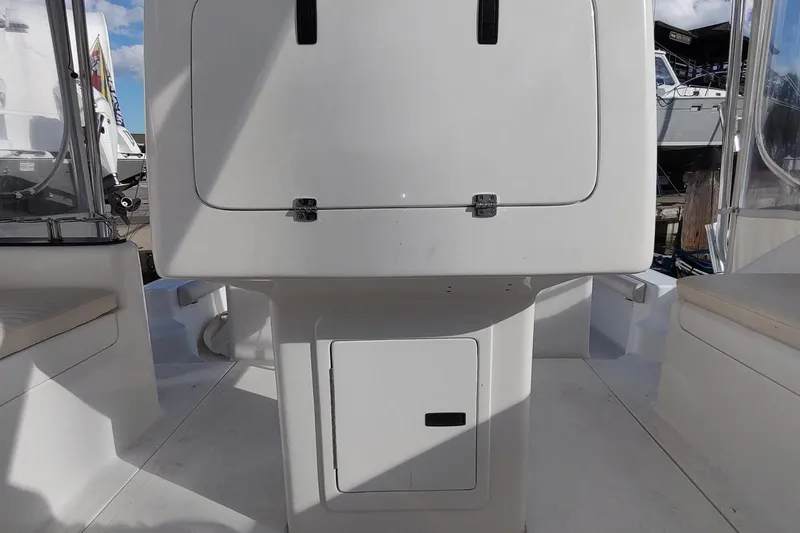 Never Enough Yacht Photos Pics 2017 Out Island SeaTek 36 Express boat interior with storage compartments.