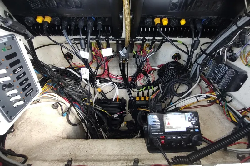 Never Enough Yacht Photos Pics Electrical wiring and control panel inside a 2017 Out Island SeaTek 36 Express boat.