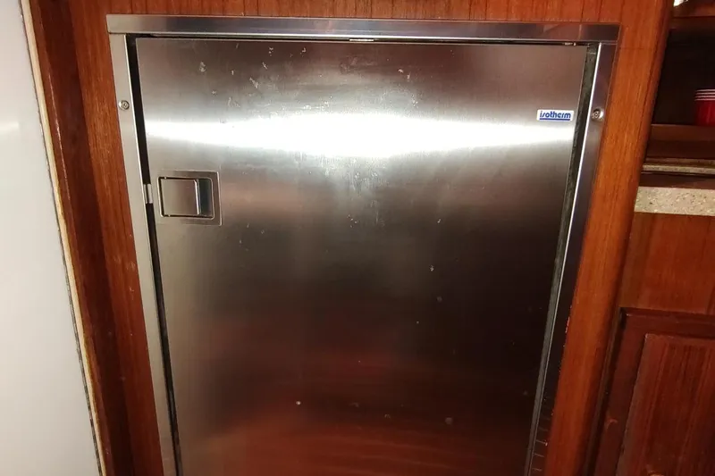 Never Enough Yacht Photos Pics Stainless steel fridge on 2017 Out Island SeaTek 36 Express boat.