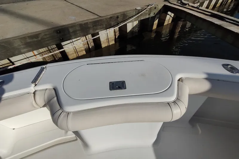 Never Enough Yacht Photos Pics 2017 Out Island SeaTek 36 Express boat interior near dock.