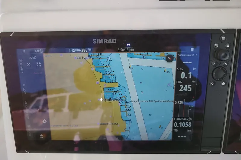 Never Enough Yacht Photos Pics Simrad navigation display on 2017 Out Island SeaTek 36 Express boat, showing Annapolis Harbor map.