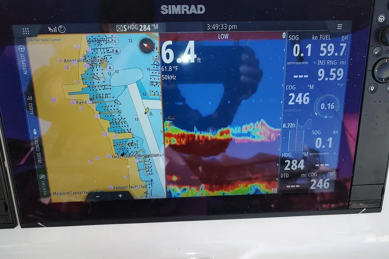 Never Enough Yacht Photos Pics Simrad marine navigation display on 2017 Out Island SeaTek 36 Express boat.