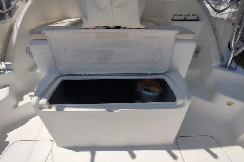 Never Enough Yacht Photos Pics Open storage compartment on 2017 Out Island SeaTek 36 Express boat.