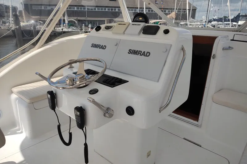 Never Enough Yacht Photos Pics 2017 Out Island SeaTek 36 Express helm with Simrad electronics and dual controls.