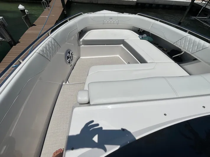  Yacht Photos Pics 2024 Regal 33 SAV boat interior with spacious seating and modern design.