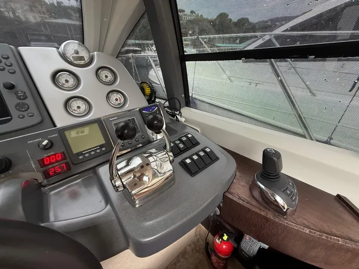  Yacht Photos Pics Control panel of a 2011 Azimut 43S yacht, featuring gauges and navigation controls.
