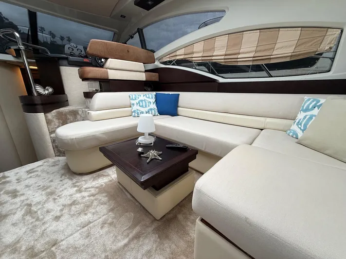  Yacht Photos Pics Luxurious interior of 2011 Azimut 43S yacht with plush seating and elegant decor.