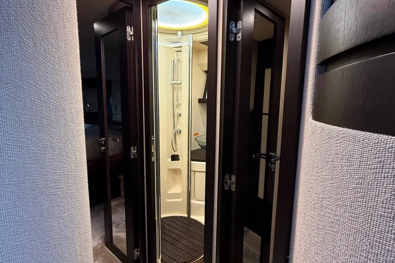  Yacht Photos Pics Luxurious bathroom interior of 2011 Azimut 43S yacht with modern shower design.