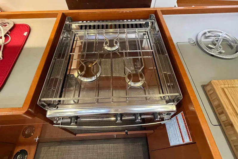 Allure Yacht Photos Pics Stove and custom cutting board.