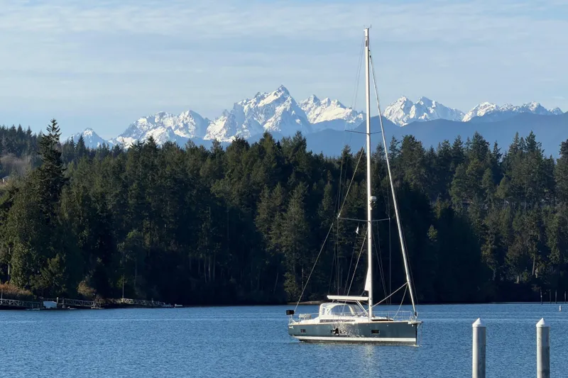 Allure Yacht Photos Pics Port Madison anchorage, Olympic Mountains background.