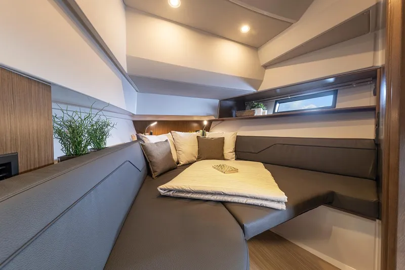 Inventory Clearance Yacht Photos Pics Luxurious interior of 2023 Bavaria Vida 33 yacht with cozy seating and modern design.
