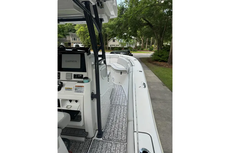  Yacht Photos Pics 2021 Sea Fox 288 Commander boat with Garmin navigation, parked on a driveway.