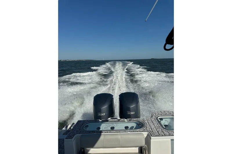  Yacht Photos Pics 2021 Sea Fox 288 Commander boat cruising on open water with twin engines.