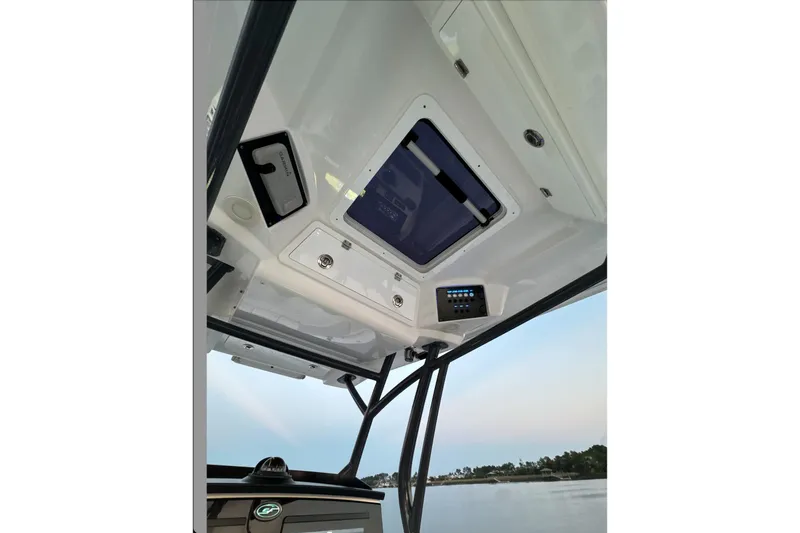  Yacht Photos Pics 2021 Sea Fox 288 Commander boat interior ceiling view with control panel.