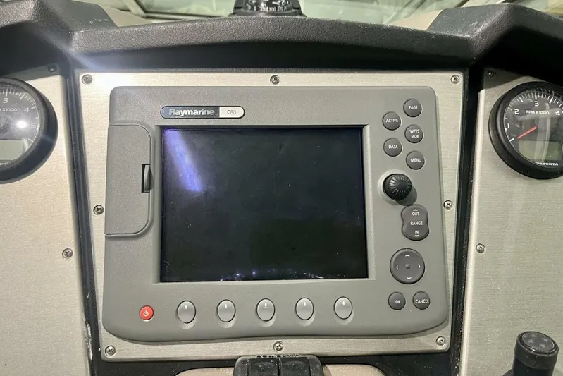  Yacht Photos Pics Raymarine C80 navigation system on 2011 Cruisers Yachts 330 Express dashboard.