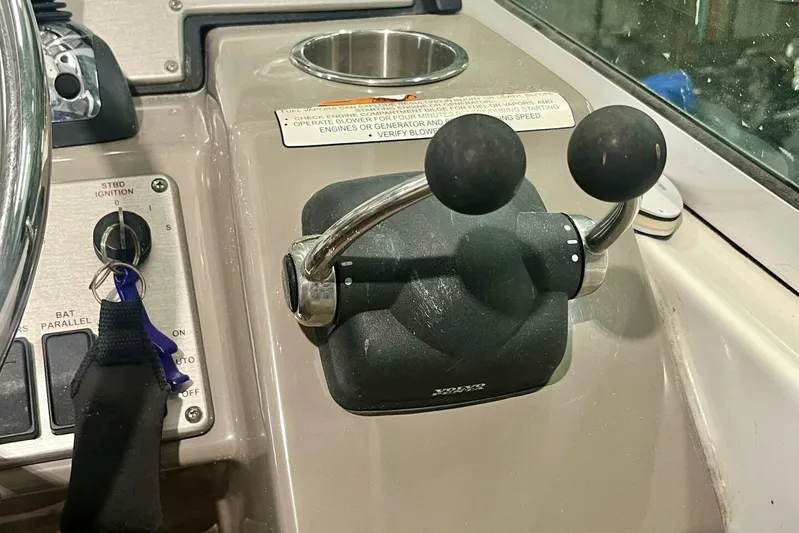  Yacht Photos Pics Control panel of 2011 Cruisers Yachts 330 Express with throttle and ignition switches.