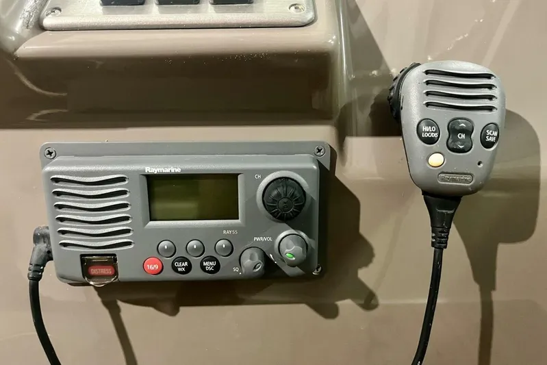  Yacht Photos Pics Raymarine marine radio system on 2011 Cruisers Yachts 330 Express dashboard.