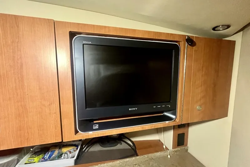  Yacht Photos Pics Sony Bravia TV in 2011 Cruisers Yachts 330 Express cabin, wooden cabinetry.