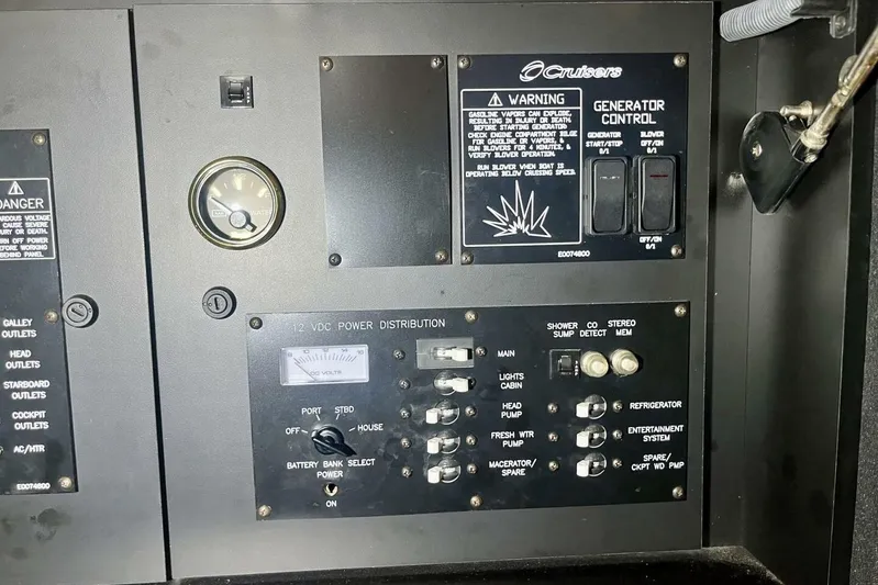  Yacht Photos Pics Control panel of 2011 Cruisers Yachts 330 Express with generator and power distribution switches.