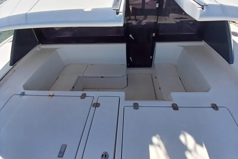 Mere Cat Yacht Photos Pics 2018 Leopard 45 yacht cockpit with storage compartments and seating area.