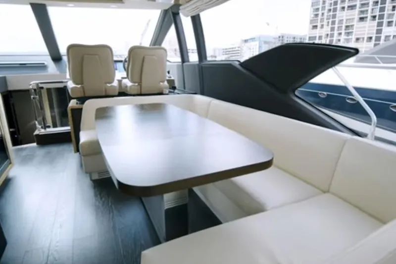 No Name Yacht Photos Pics Luxurious interior of 2017 Azimut 66 yacht with elegant seating and modern design.