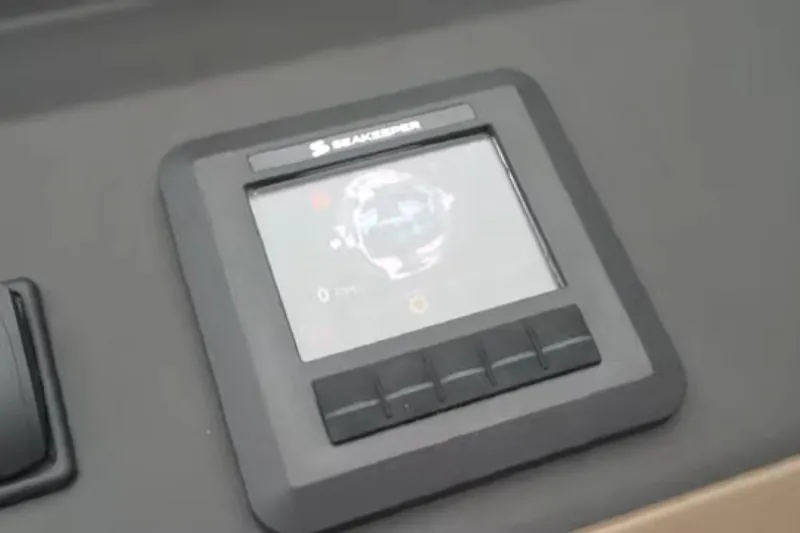 No Name Yacht Photos Pics Seakeeper control panel on 2017 Azimut 66 yacht dashboard.