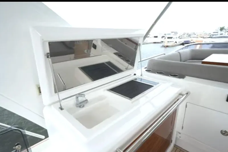 No Name Yacht Photos Pics Luxury Azimut 66 yacht's outdoor kitchenette with sink and grill, 2017 model.