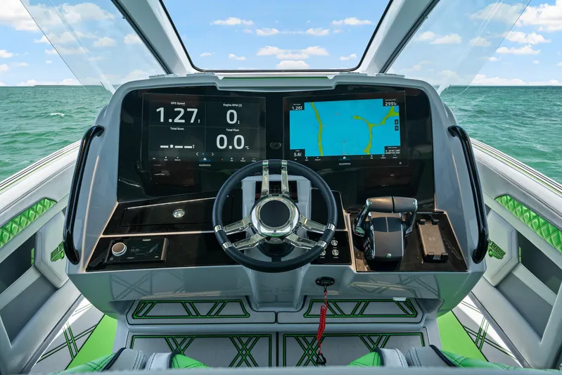  Yacht Photos Pics Cockpit of 2026 Deep Impact 399 Sport boat with modern navigation displays.