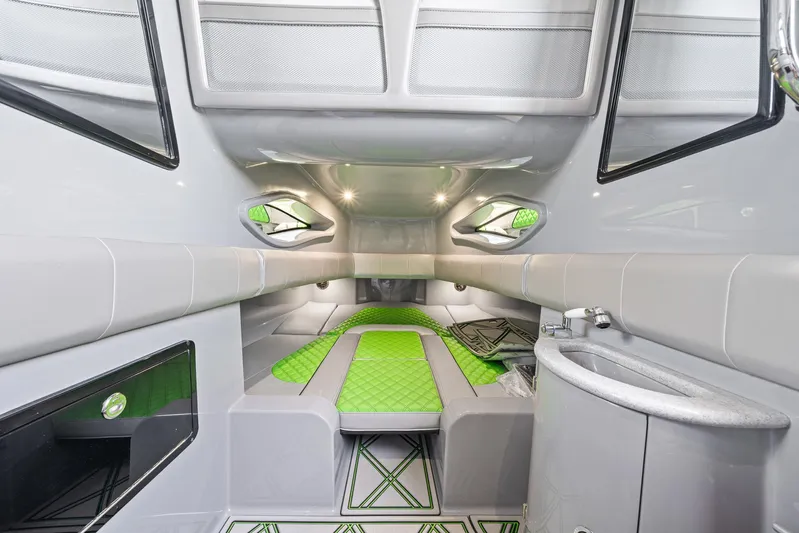  Yacht Photos Pics Interior of 2026 Deep Impact 399 Sport boat with modern design and green accents.