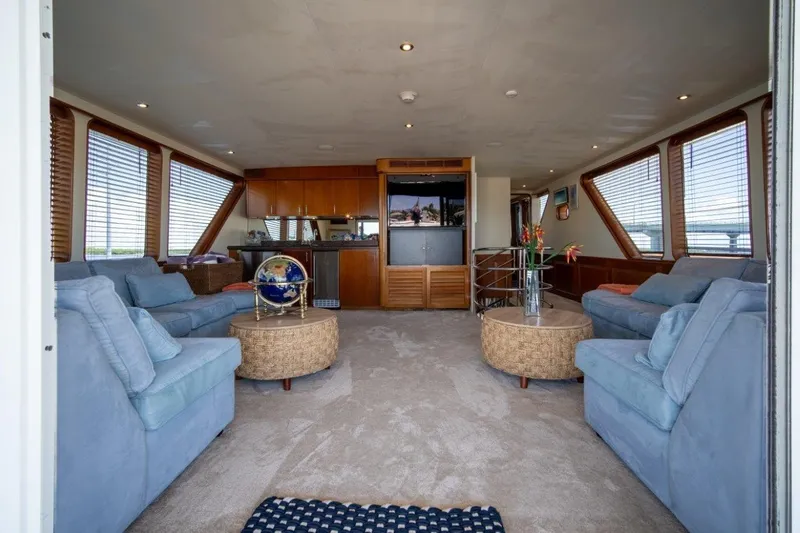 Flying Dutchman Yacht Photos Pics Luxurious 1984 Lloyds Ships Tri-Deck yacht interior with plush seating and elegant decor.